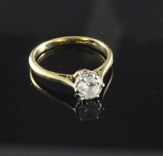An 18ct gold and platinum, solitaire diamond ring, size L.